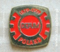 Odznaka Defum czerwona.jpg